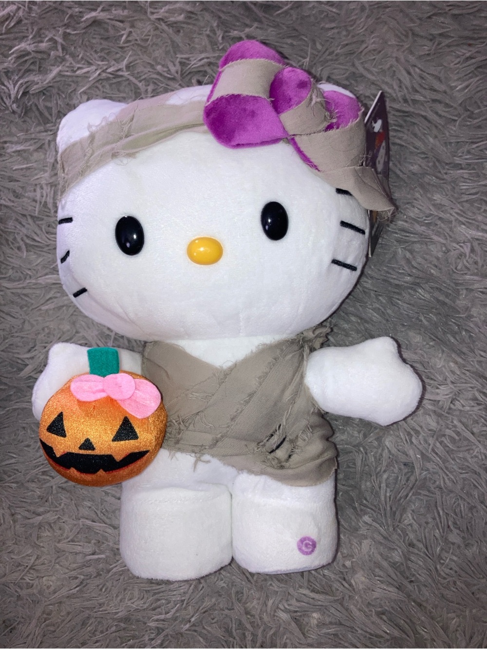 Sanrio Hello Kitty Plush in White, Gray and Purple with Orange Pumpkin